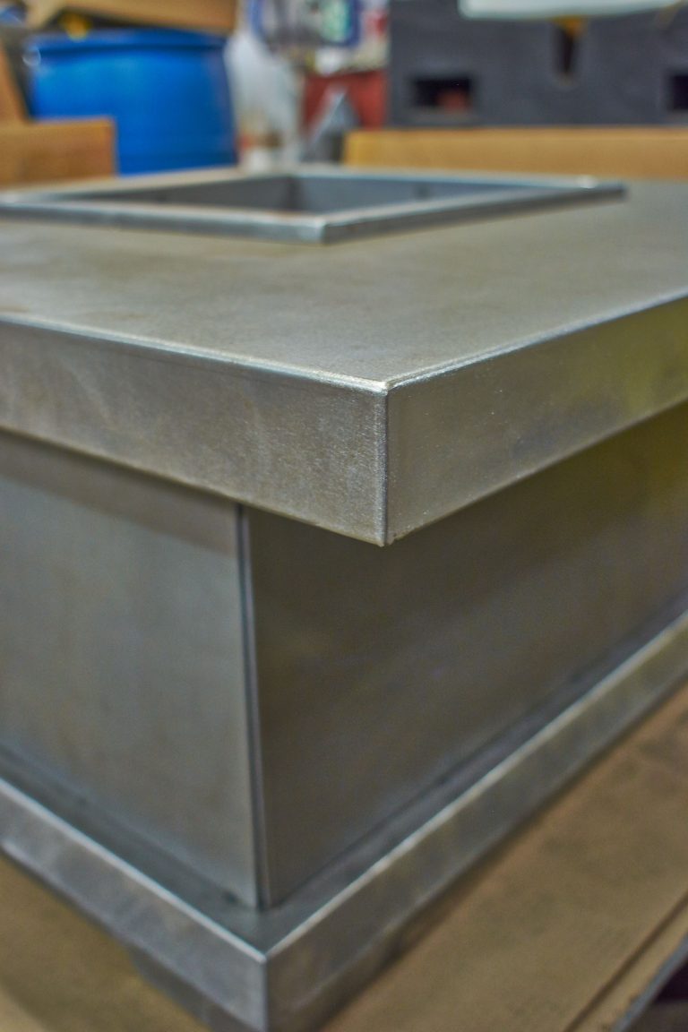Gas fireplace for gallery of Jensen Metal Products is a custom sheet metal fabrication manufacturer in Racine Wisconsin